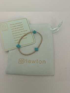 Newton Turquoise & Gold Cross Stretch Bracelet Set.  Does not come with bag